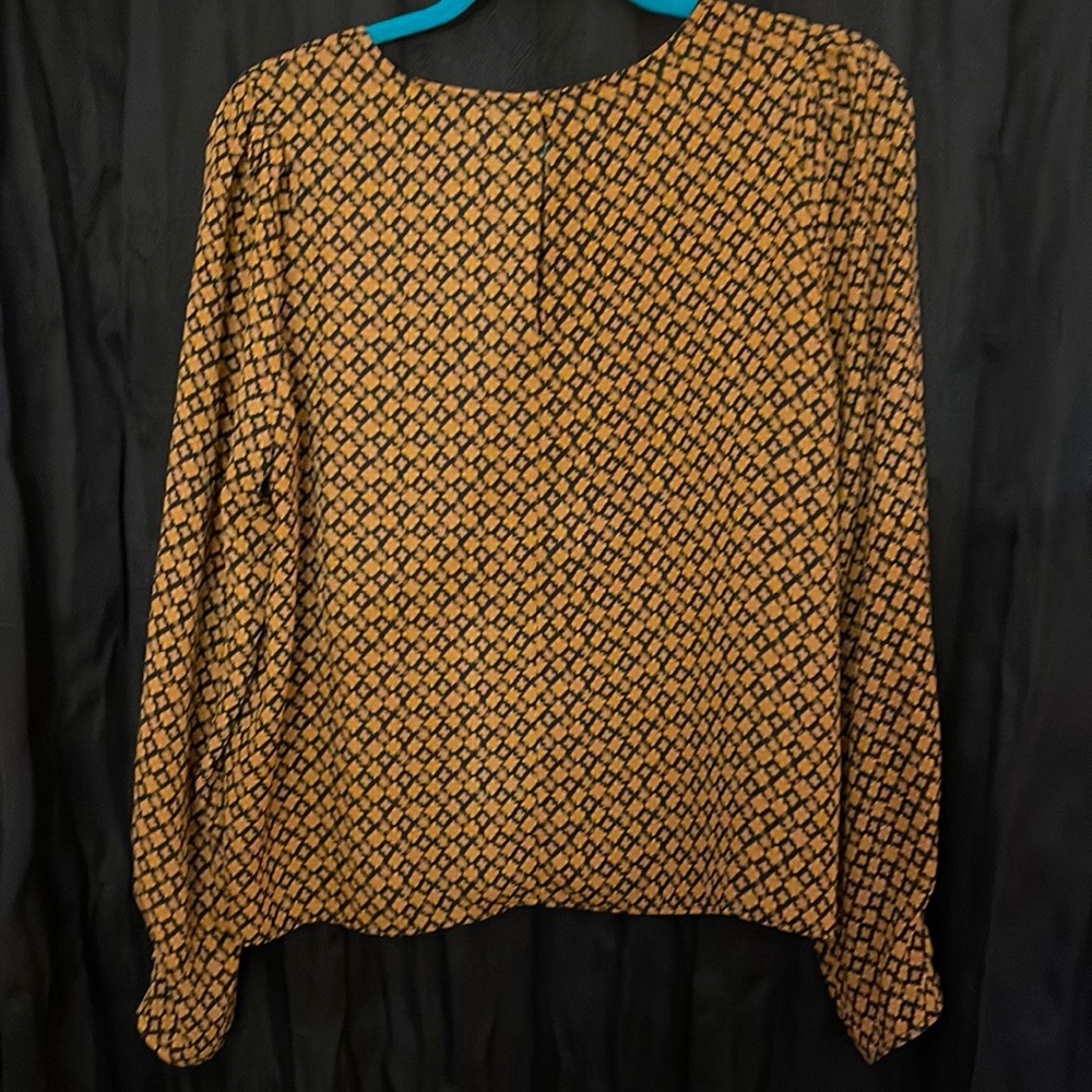 Cute orange and navy blouse. Size 14 from H&M. Great for work attire.